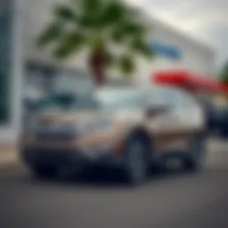 A 2016 Honda CR-V EX-L with 90,000 miles parked outside a dealership, showcasing its sleek design and features.