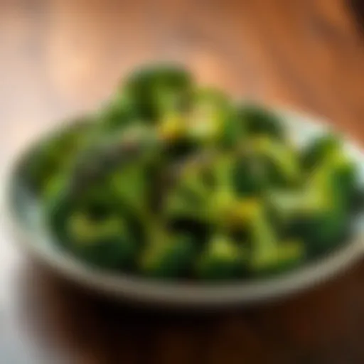A plate of perfectly charred broccoli garnished and ready to eat, showcasing its vibrant green color and crisp texture.