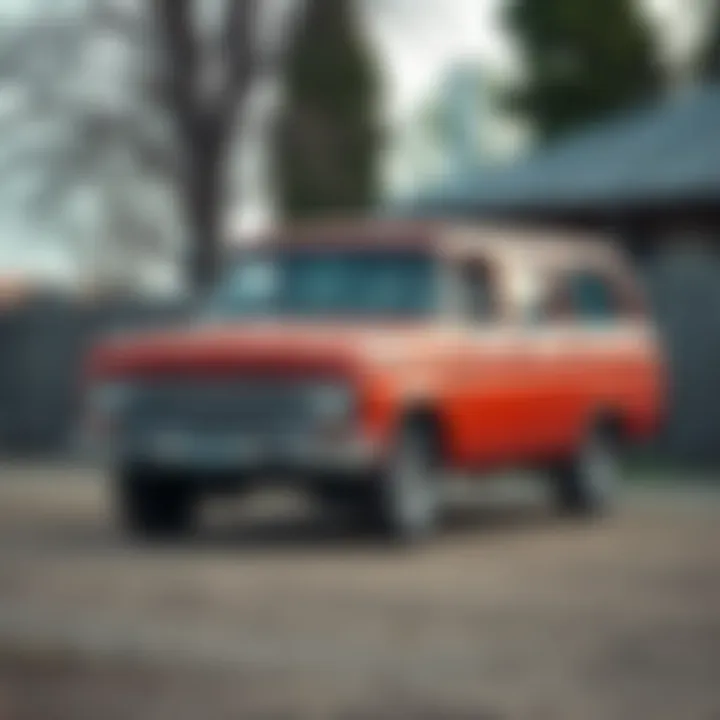 A vintage square body Suburban parked in a rustic setting, showcasing its classic design and potential for refurbishment.