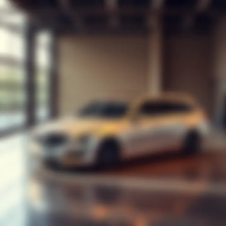 Comparing Auctions for Classic Cars An elegant 2013 CTS sport wagon parked in a sleek garage, representing the choice between Cars and Bids and Bring a Trailer for selling collectible cars.