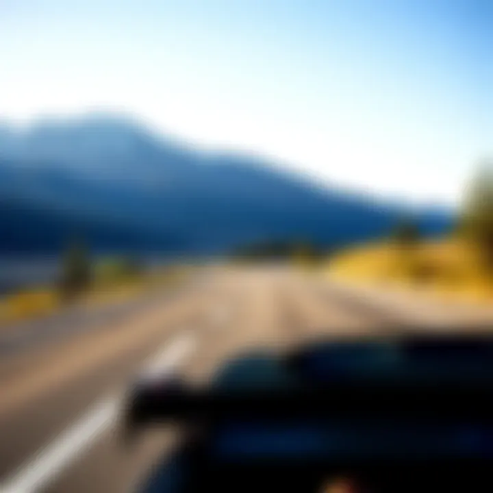 A car on a scenic highway heading towards San Francisco International Airport with mountains in the background