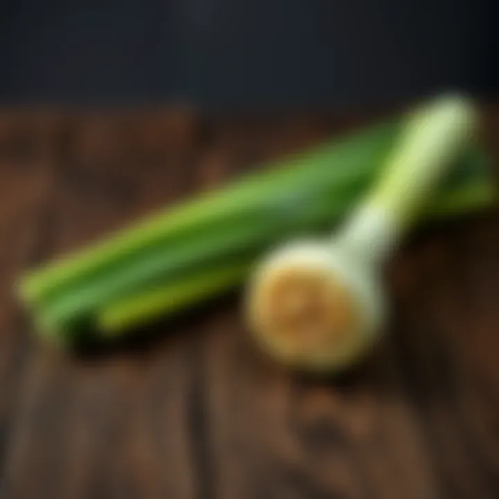 A fresh green leek placed on a wooden table, highlighting its vibrant color and texture.