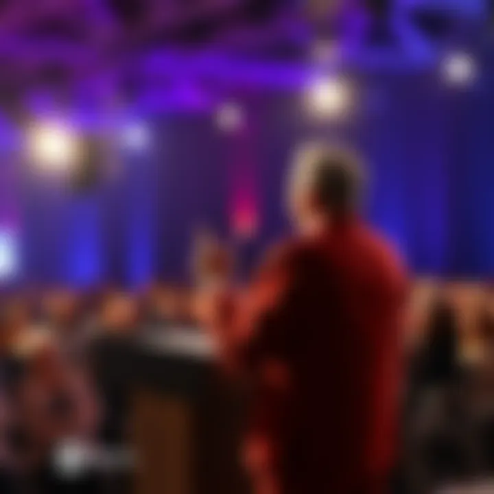 A public figure giving a speech on stage with an engaged audience, reflecting diverse reactions