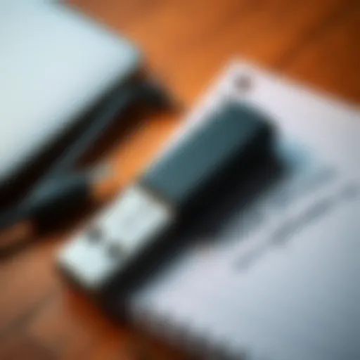 A USB drive placed next to a notepad with a seed phrase written on it, symbolizing digital asset security.