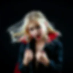 A young blonde girl dressed as a vampire in a provocative pose, set against a dark background.
